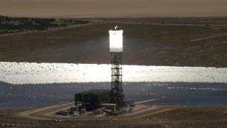 FG0001_000186 - 4K aerial stock footage orbit one of the power towers at the Ivanpah Solar Electric Generating System in California