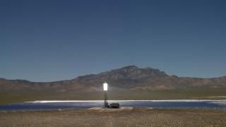 4K aerial stock footage zoom tighter and orbit an array at the Ivanpah Solar Electric Generating System in California Aerial Stock Footage | FG0001_000194