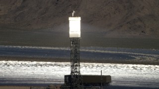 4K aerial stock footage of power tower and boiler at the Ivanpah Solar Electric Generating System in California Aerial Stock Footage | FG0001_000199