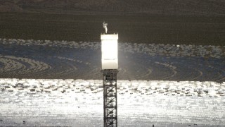 4K aerial stock footage of a boiler atop a power tower at the Ivanpah Solar Electric Generating System in California Aerial Stock Footage | FG0001_000200