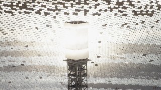 4K aerial stock footage of glowing power tower boiler at the Ivanpah Solar Electric Generating System in California Aerial Stock Footage | FG0001_000205