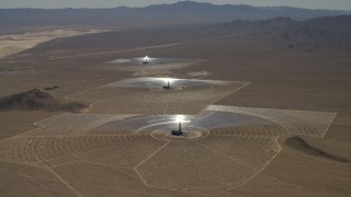 FG0001_000212 - 4K aerial stock footage tilt to reveal the solar power structures at the Ivanpah Solar Electric Generating System in California