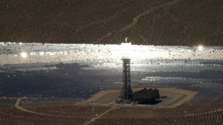 4K aerial stock footage of a mirror array and power tower at the Ivanpah Solar Electric Generating System in California Aerial Stock Footage | FG0001_000224