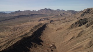 4K aerial stock footage of a view across rough desert mountains in the Nevada Desert Aerial Stock Footage | FG0001_000254