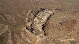 4K aerial stock footage approach a scarred hillside in the Nevada Desert Aerial Stock Footage | FG0001_000265