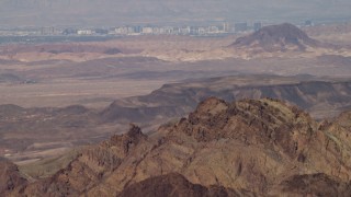 4K aerial stock footage tilt from desert mountains to reveal the casino hotels of Las Vegas, Nevada Aerial Stock Footage | FG0001_000291