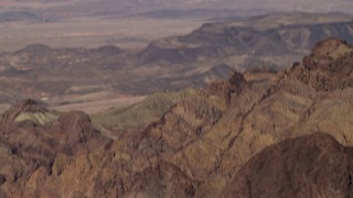 4K aerial stock footage tilt from mountains in the desert and reveal the casino hotels of Las Vegas, Nevada Aerial Stock Footage | FG0001_000292