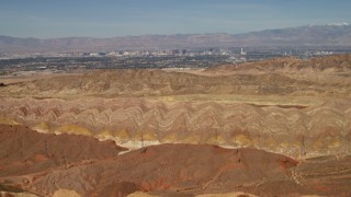 4K aerial stock footage tilt from barren desert mountains to reveal Las Vegas, Nevada Aerial Stock Footage | FG0001_000301