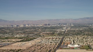 4K aerial stock footage of Las Vegas hotels and casinos seen from suburban neighborhoods, Nevada Aerial Stock Footage | FG0001_000308