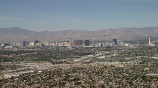 4K aerial stock footage of Las Vegas hotels and casinos seen from suburban neighborhoods, Nevada Aerial Stock Footage | FG0001_000310