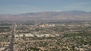 4K aerial stock footage of Downtown Las Vegas hotels and casinos seen from I-515 and suburban neighborhoods, Nevada Aerial Stock Footage | FG0001_000311