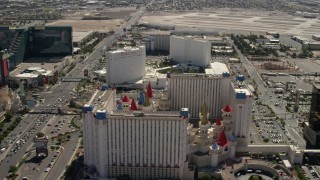 4K aerial stock footage of the Tropicana and Excalibur on Tropicana Avenue, and reveal Luxor on the Las Vegas Strip, Nevada Aerial Stock Footage | FG0001_000328