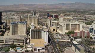 4K aerial stock footage flyby casino resorts on the Las Vegas Strip, Nevada, and reveal the High Roller Ferris wheel Aerial Stock Footage | FG0001_000336