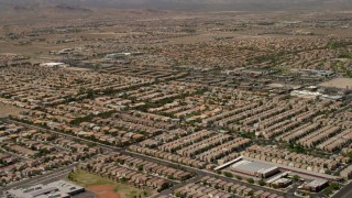 4K aerial stock footage fly over neighborhoods with tract homes and approach apartment buildings in Las Vegas, Nevada Aerial Stock Footage | FG0001_000357