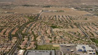 4K aerial stock footage fly over and pan across neighborhoods with tract homes and apartment buildings in Las Vegas, Nevada Aerial Stock Footage | FG0001_000358