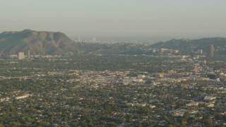 HD stock footage aerial video fly over North Hollywood toward Mount Lee and Downtown Los Angeles, California, sunset Aerial Stock Footage | HDA06_01