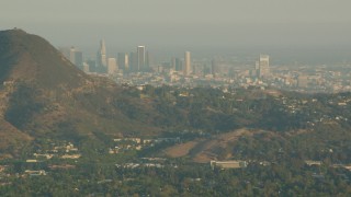 HD stock footage aerial video Downtown Los Angeles skyline, seen from the Hollywood Hills in California at sunset Aerial Stock Footage | HDA06_02