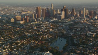 HD stock footage aerial video Downtown Los Angeles seen from Echo Lake at sunset, Echo Park, California Aerial Stock Footage | HDA06_16