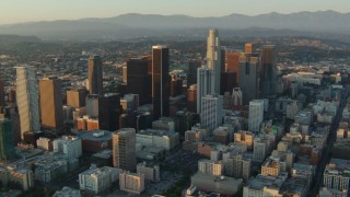 HD stock footage aerial video flyby high-rises and skyscrapers at sunset in Downtown Los Angeles, California Aerial Stock Footage | HDA06_25