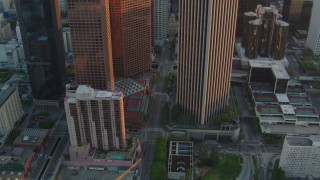 HD stock footage aerial video tilt and follow S Hope Street at sunset in Downtown Los Angeles, California Aerial Stock Footage | HDA06_31