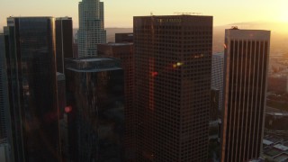 HD stock footage aerial video orbit a group of skyscrapers at sunset in Downtown Los Angeles, California Aerial Stock Footage | HDA06_43