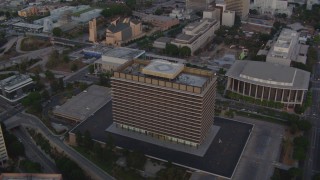 HDA06_69 - HD stock footage aerial video 110 freeway, Dorothy Chandler Pavilion, office building, and cathedral at twilight, Downtown Los Angeles, California