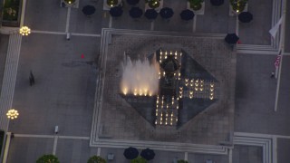 HD stock footage aerial video bird's eye view of a fountain at twilight in Downtown Los Angeles, California Aerial Stock Footage | HDA06_73