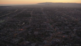 HD stock footage aerial video Los Angeles urban neighborhoods at twilight, California Aerial Stock Footage | HDA06_79