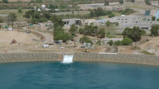 HD stock footage aerial video of of the LA Reservoir, zoom to water treatment plant in Granada Hills, California Aerial Stock Footage | HDA07_36