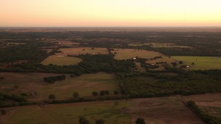 HD stock footage aerial video of wide view of farm fields at sunrise in Decatur, Texas Aerial Stock Footage | HDA12_032