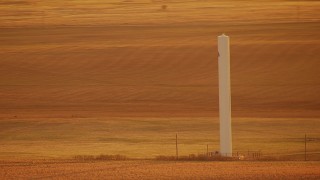 HD stock footage aerial video of a silo in the middle of a field at sunrise in Oklahoma Aerial Stock Footage | HDA12_059