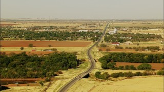 HD stock footage aerial video of flying by Highway 53 by the town of Walters, Oklahoma Aerial Stock Footage | HDA12_080