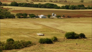 HD aerial stock footage video of a barn and tractors in Temple, Oklahoma Aerial Stock Footage | HDA12_107