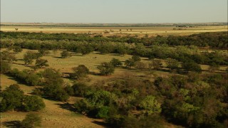 HD stock footage aerial video of farm fields and trees in Oklahoma Aerial Stock Footage | HDA12_113