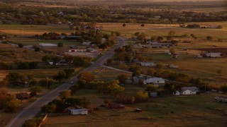 HD stock footage aerial video of a small rural town at sunset in Nocona, Texas Aerial Stock Footage | HDA12_149