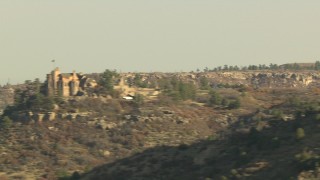 HDA13_282 - HD stock footage aerial video of an isolated hilltop mansion in Castle Pines, Colorado