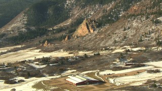 HD stock footage aerial video of approaching rural homes at the base of Rocky Mountains, Colorado Aerial Stock Footage | HDA13_285