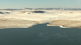 HD stock footage aerial video fly over a lake toward the opposite, snowy shore in Park County, Colorado Aerial Stock Footage | HDA13_312