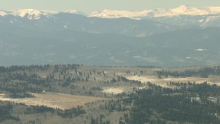 HD stock footage aerial video of hillside homes and the Rocky Mountains. Colorado Aerial Stock Footage | HDA13_341