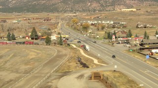 HD stock footage aerial video of flying over highway to land next to hotel in Ridgway, Colorado Aerial Stock Footage | HDA13_346