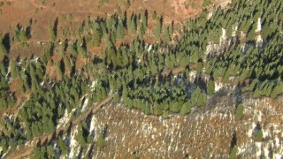 HD stock footage aerial video bird's eye view of mountain slopes with light snow, Rocky Mountains, California Aerial Stock Footage | HDA13_380_01