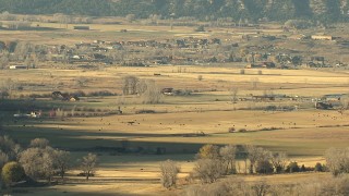 HD stock footage aerial video of grazing lands and livestock at sunset near Ridgway, Colorado Aerial Stock Footage | HDA13_393