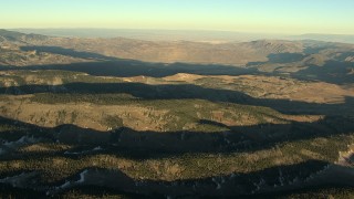 HD stock footage aerial video of rounded mountain ridges at sunrise in the Rocky Mountains, Colorado Aerial Stock Footage | HDA13_411