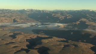 HD stock footage aerial video of a wide view of the Blue Mesa Reservoir and Rocky Mountains at sunrise, Colorado Aerial Stock Footage | HDA13_414_01