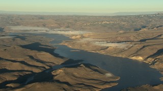 HD stock footage aerial video of the Blue Mesa Reservoir and Rocky Mountains at sunrise, Colorado Aerial Stock Footage | HDA13_419