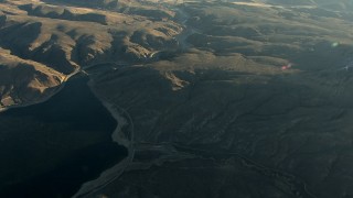 HD stock footage aerial video tilt from the Blue Mesa Reservoir at sunrise to reveal the town of Gunnison, Colorado Aerial Stock Footage | HDA13_421