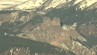 HD stock footage aerial video of jagged Rocky Mountains with snow at sunrise, Colorado Aerial Stock Footage | HDA13_433