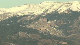 HD stock footage aerial video of the snow-capped Rocky Mountains at sunrise, Colorado Aerial Stock Footage | HDA13_434