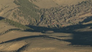 HD stock footage aerial video of rural homes and trees at sunrise in Colorado Aerial Stock Footage | HDA13_436