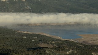 HD stock footage aerial video of fog over the Taylor Park Reservoir at sunrise, Colorado Aerial Stock Footage | HDA13_443